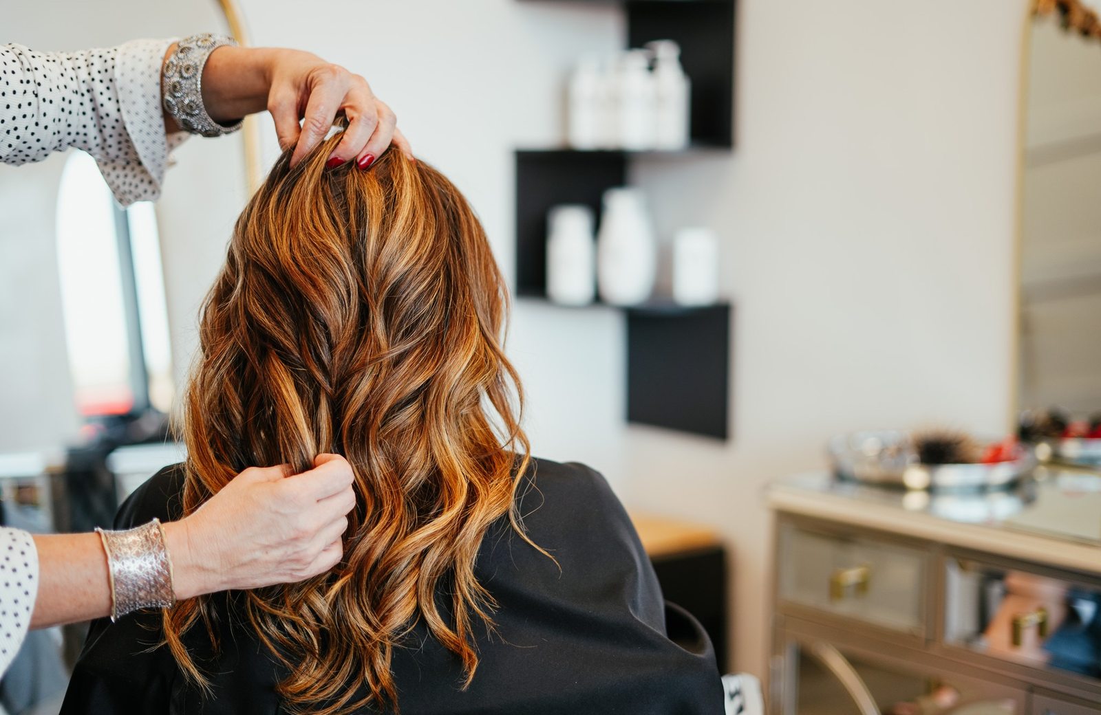 Finished balayage color and soft waves on hair extensions, styled at Style Me Up Hair Salon in Overland Park, Kansas