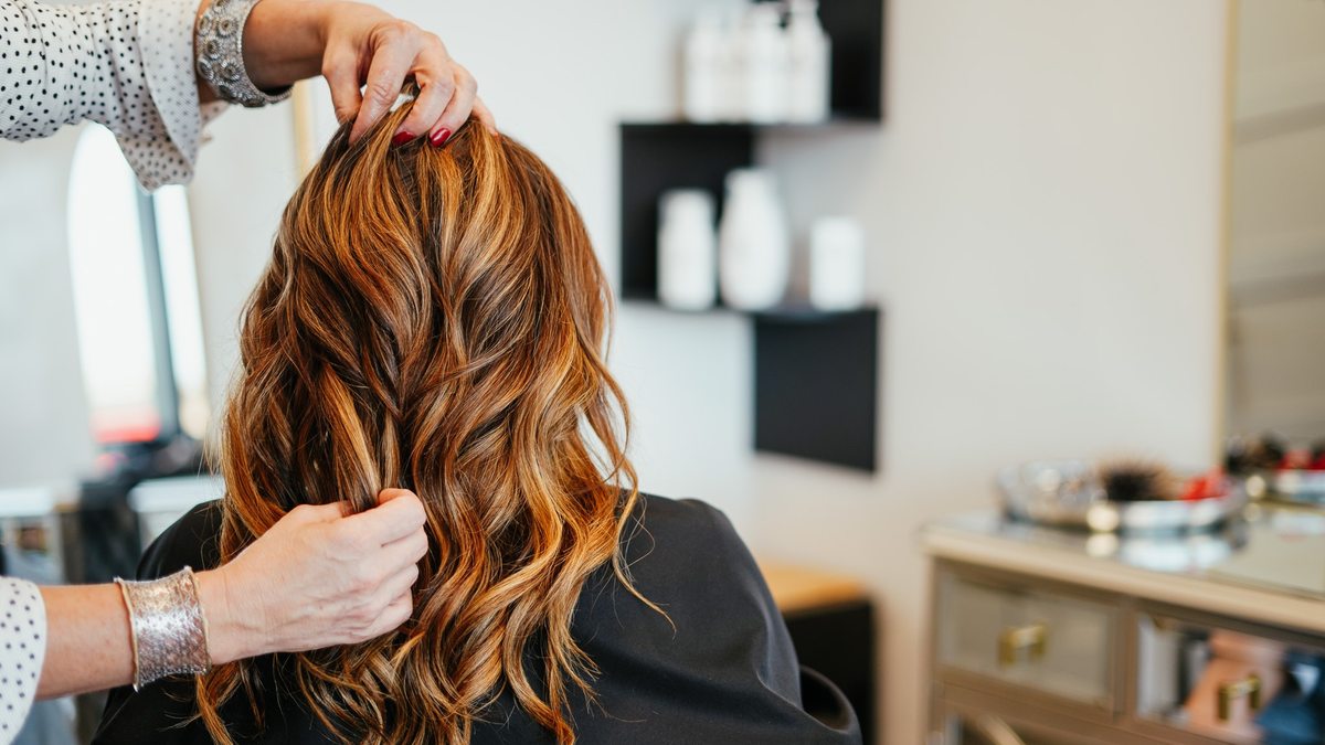 Finished balayage color and extensions styled at Style Me Up Hair Salon